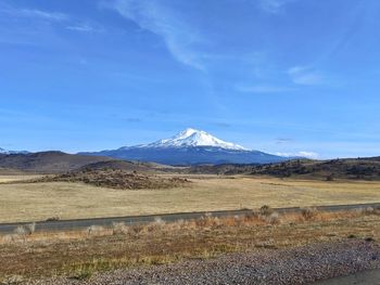 Scenic view of mt shasta traveling through the mountains in northern california. winter landscape.