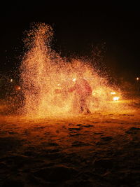 Firework display at night