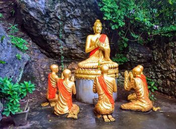 Statue against temple