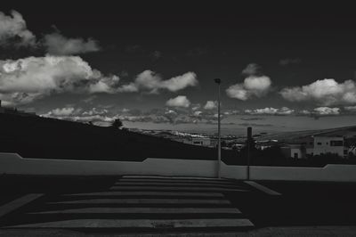 Built structure against cloudy sky