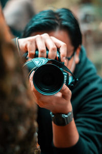 Midsection of man photographing