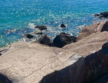 High angle view of rocks on beach