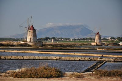 Traditional windmill against clear sky