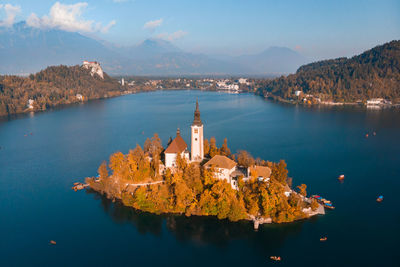 Panoramic view of sea and buildings against sky