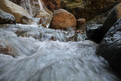 Stream flowing through rocks