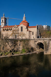 View of old building against clear blue sky