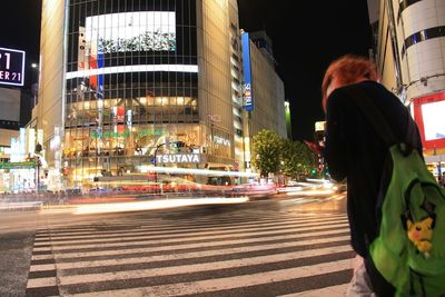 Woman standing in city