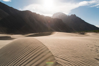 Scenic view of desert against sky