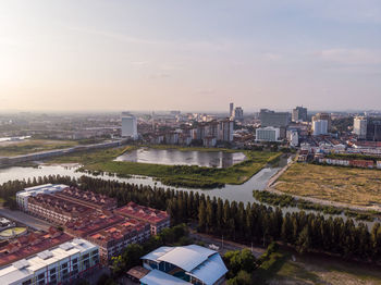 High angle view of buildings in city against sky