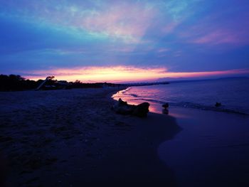 Scenic view of sea at sunset