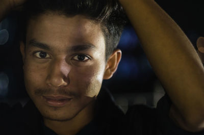 Close-up portrait of smiling mid adult man