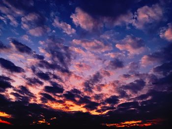 Low angle view of dramatic sky during sunset