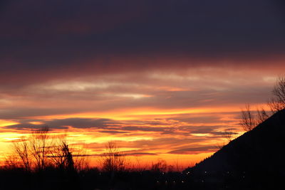 Scenic view of dramatic sky during sunset