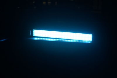 Defocused image of illuminated lamp at night
