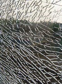 Full frame shot of broken glass window