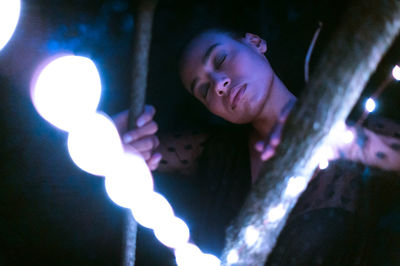 Portrait of boy with illuminated lights