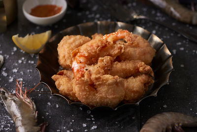 Close-up of served food in bowl on table