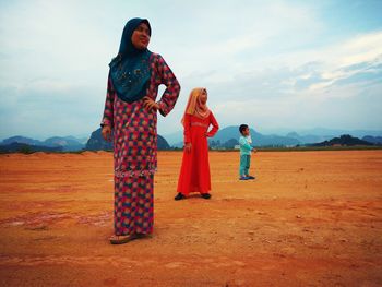 People standing on landscape