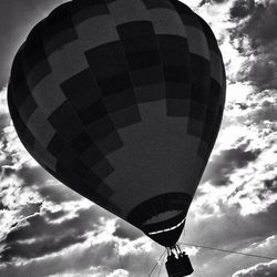 Low angle view of people against sky