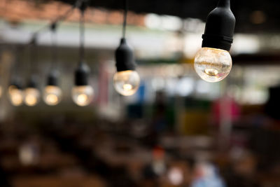 Close-up of illuminated light bulb