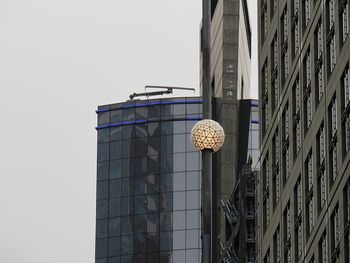 Low angle view of modern building against clear sky