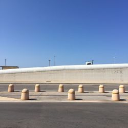 View of white building against blue sky