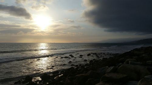 Scenic view of sea at sunset