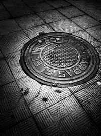 High angle view of manhole on street