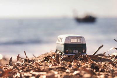 Toy vehicle at beach