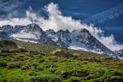 Scenic view of snowcapped mountains against sky