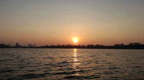 Scenic view of sea against sky during sunset