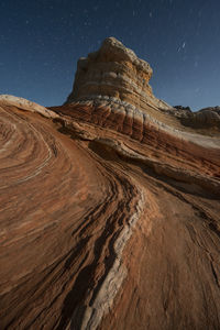 Scenic view of landscape against sky at night