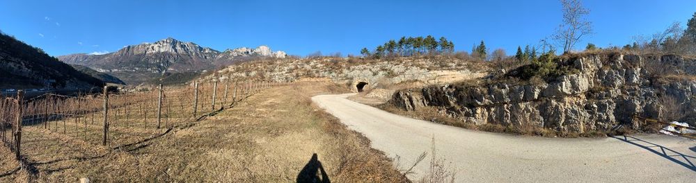 Panoramic view of road amidst mountains against sky