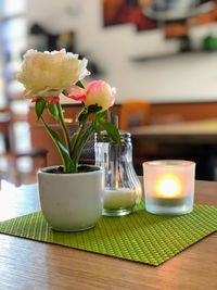 Close-up of flower vase on table