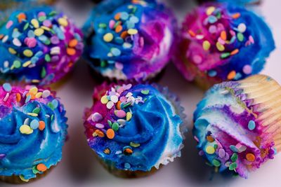 Close-up of multi colored candies on table