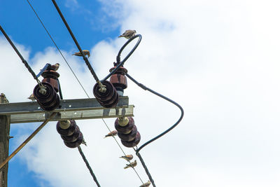 Low angle view of street light against sky