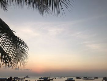 Scenic view of sea against sky at sunset