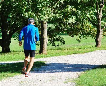 Full length of man walking in park