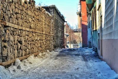 Narrow alley along buildings