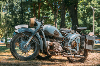 Motorcycle parked on field