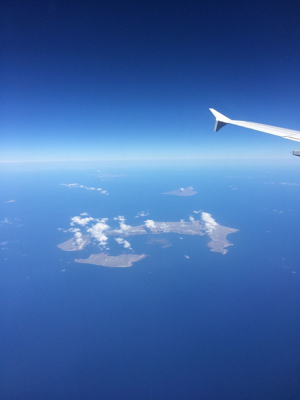 AERIAL VIEW OF CLOUDS OVER SEA