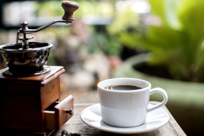 Close-up of coffee cup on table