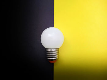 Close-up of illuminated light bulb