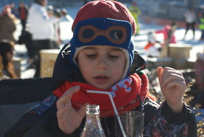 Portrait of cute boy drinking ice cream