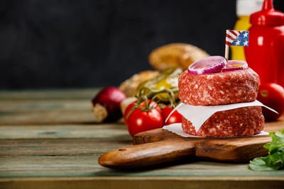 Close-up of meat on cutting board