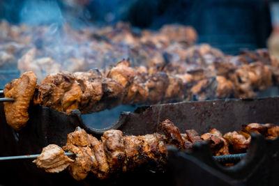 Close-up of meat on barbecue grill