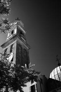 Low angle view of illuminated building against sky