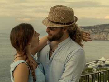 Portrait of young couple near the sea