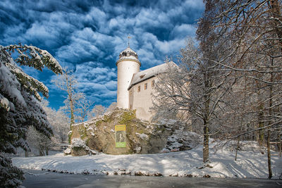 View of buildings against sky during winter