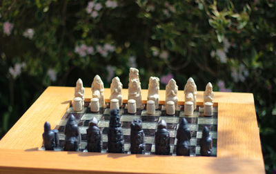 Close-up of chess pieces on table